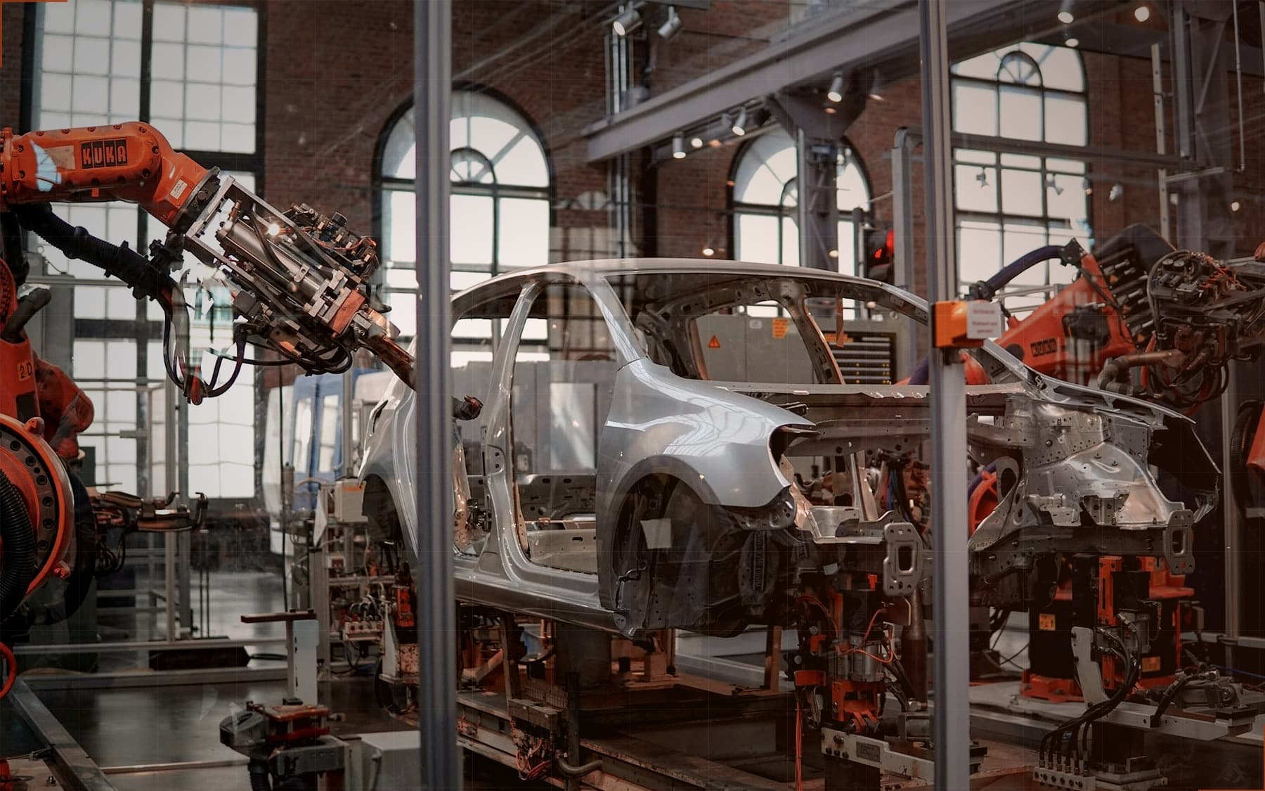 Automated production line with robotic arms